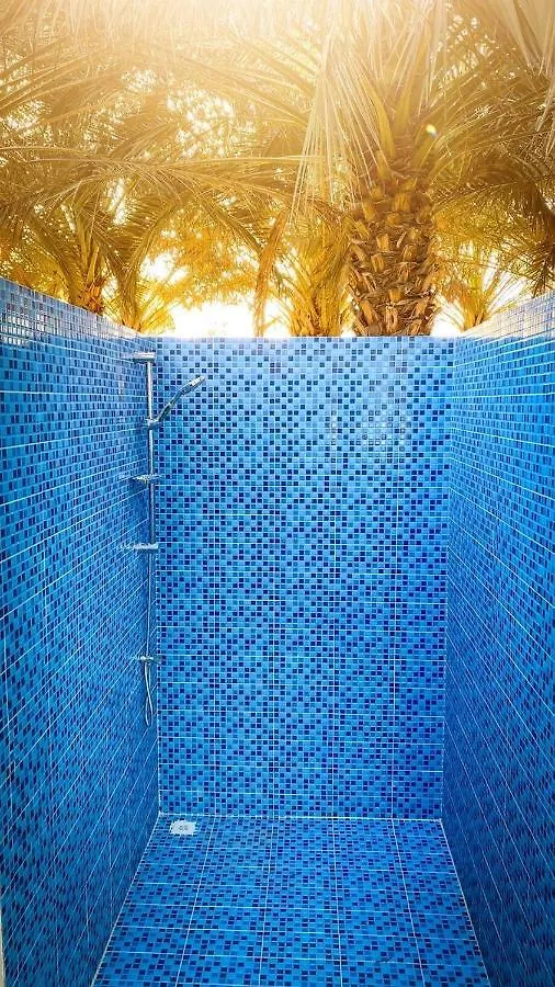 בקתה ראס אל חאימה Palm Escape Farmhouse - By Seven Elements איחוד האמירויות הערביות